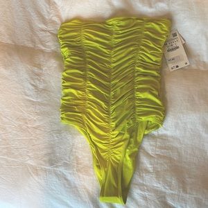 NWT- Never worn citrine colored ruched one piece bathing suit from Zara
